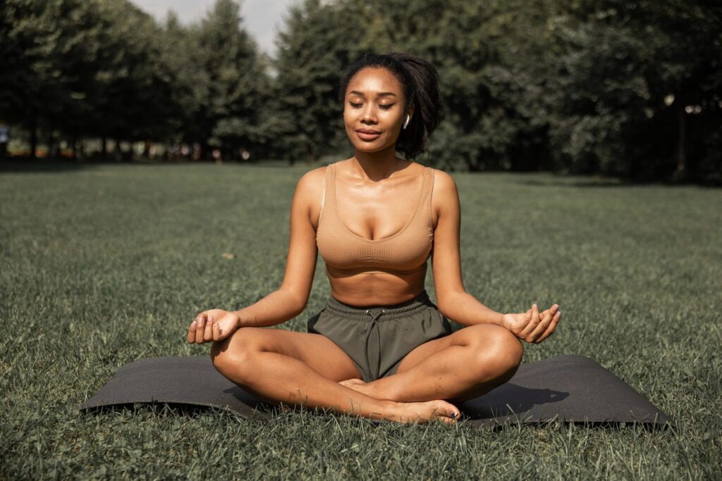 What is peace of mind? For example, a woman meditating.