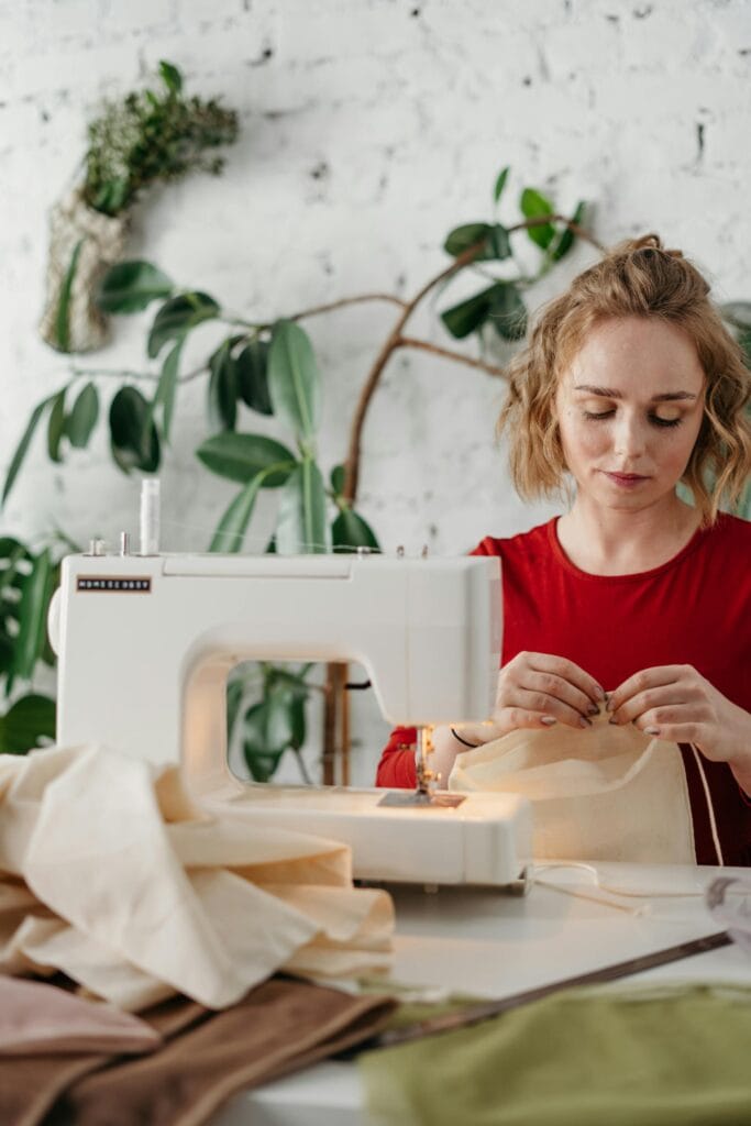 Hobbies To Start In Your 20S: A Woman Sewing