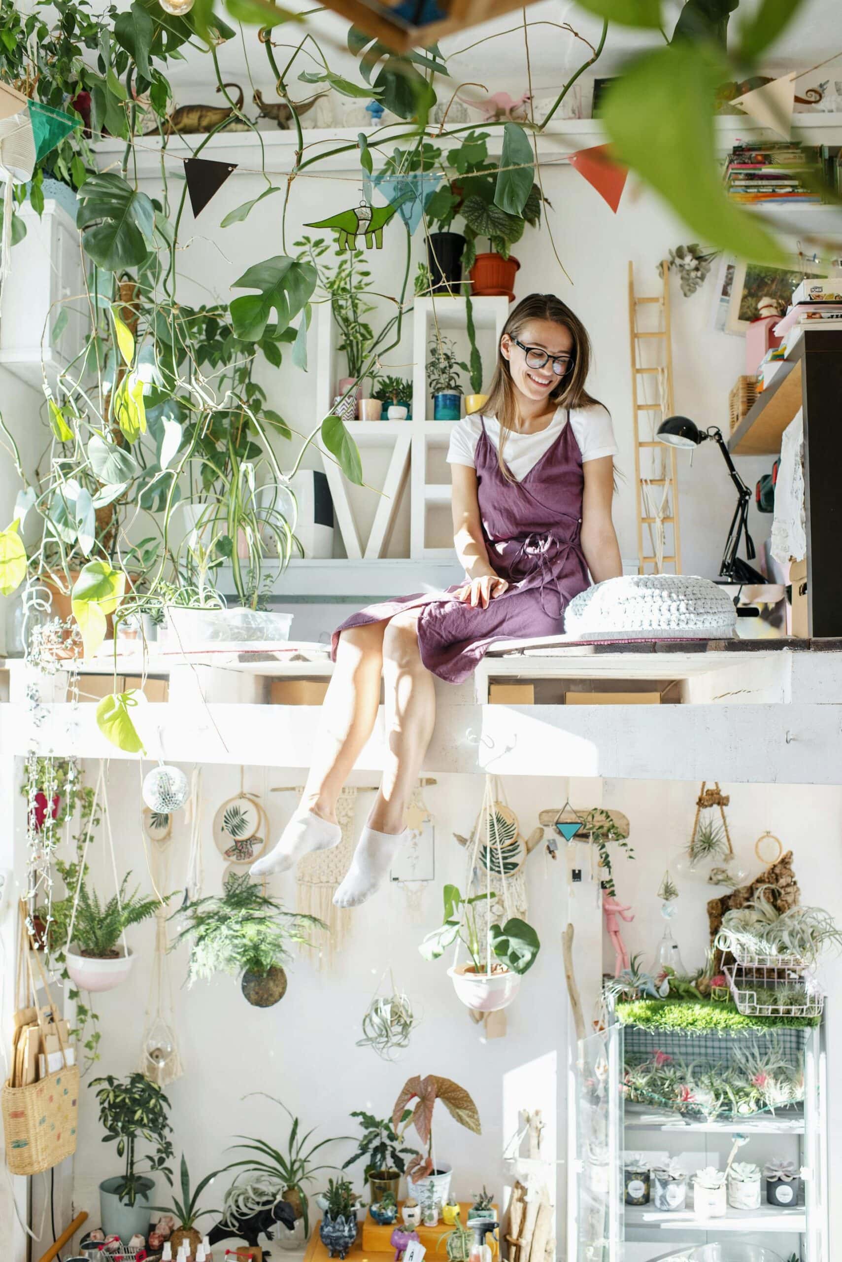 What Is An Abundance Mindset: Girl Sitting Among Plants