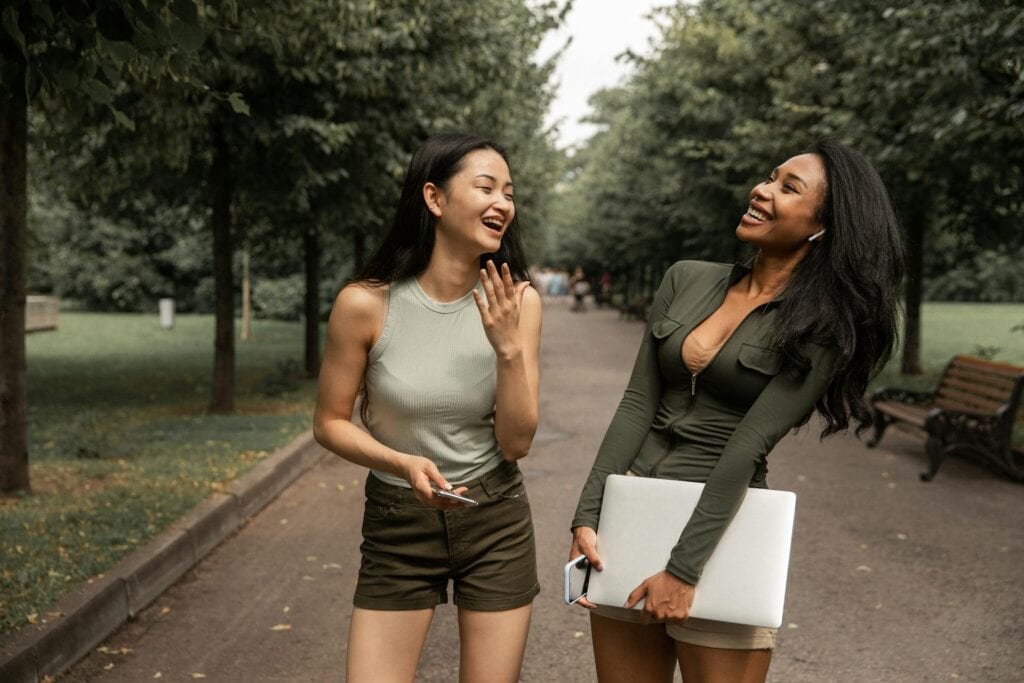 Two Women In Nature, Laughing 