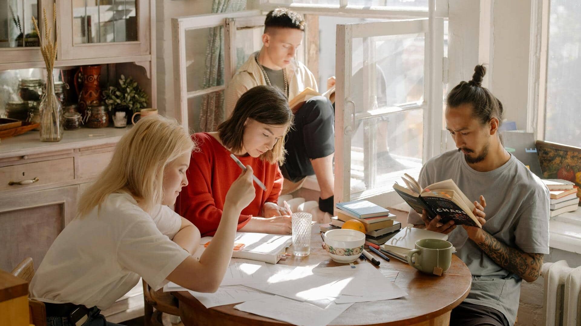 A group of young people studying together.