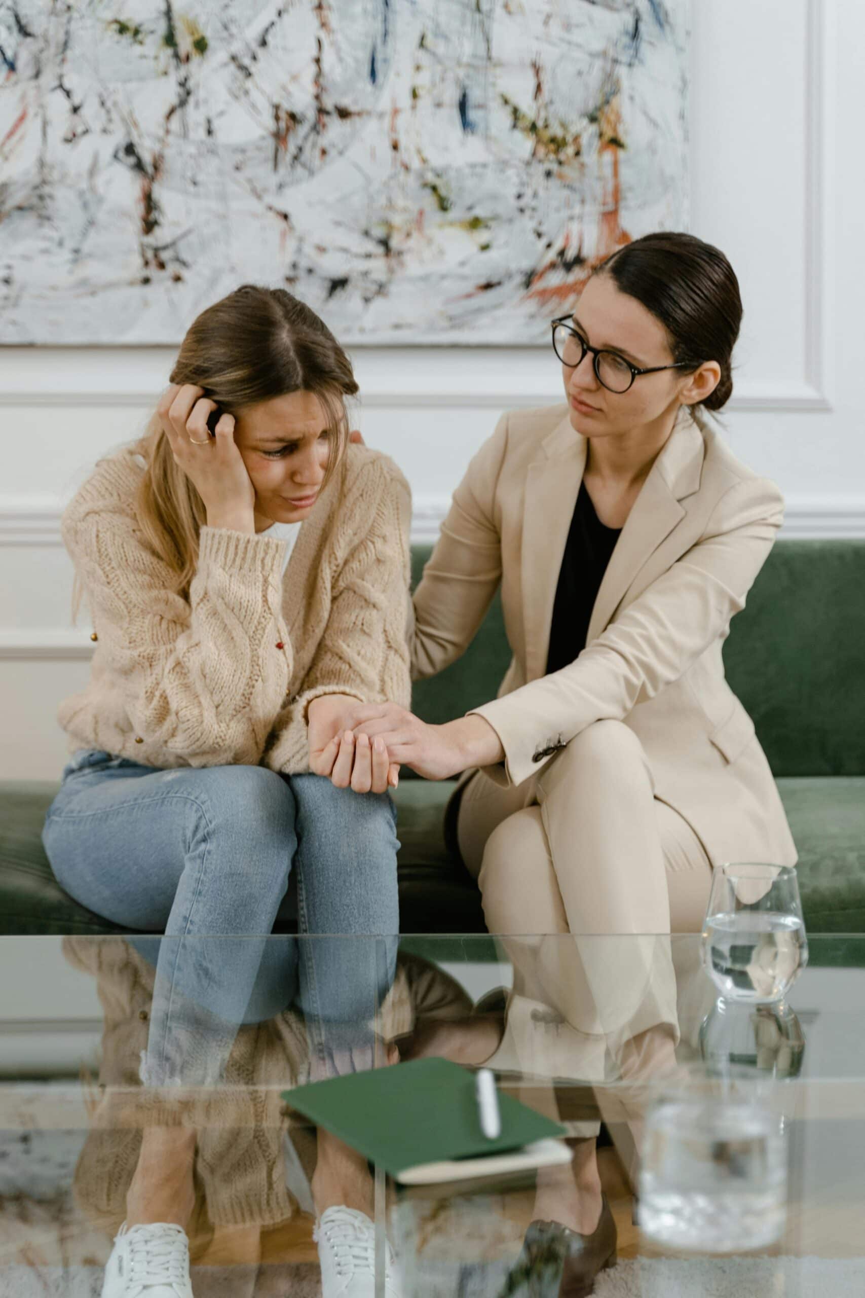 Sad woman talks to her friend who listens and supports her - 11 Tips On How To Be A Better Listener In A Relationship