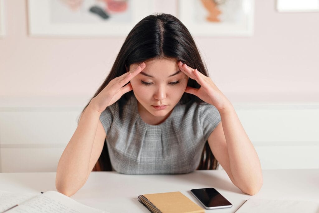 Woman feeling stressed - Signs Your Needs Aren't Being Met & How To Recognize Them