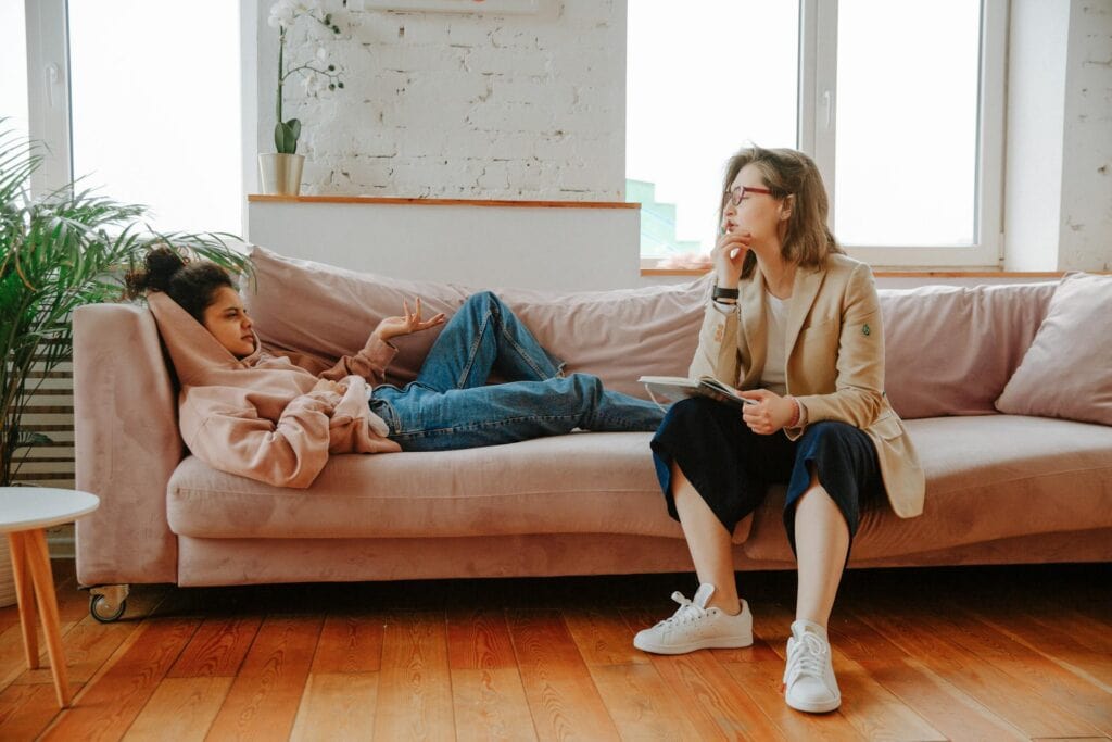 A woman and her therapist engaged in conversation.